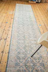 Distressed Sivas runner with sun faded light forest green lattice motif.