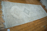 Light and airy distressed Turkish Sparta runner with faded medallion patterns.