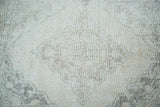 Distressed texture with faded ivory, beige, charcoal patterns on this Sparta runner detail.