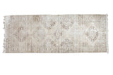 Distressed vintage Turkish Sparta runner with Rococo medallions in soft ivory, beige, coffee bronze.