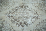 Distressed vintage Sparta runner with Rococo motif in ivory and coffee bronze.