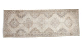 Hand knotted distressed Turkish Sparta runner, lattice medallion pattern in ivory and bronze.