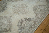 Distressed Turkish Sparta runner detail with textured beige and bronze staggered medallions.