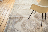 Soft ivory border and distressed flayed medallion detail on Turkish Sparta runner.