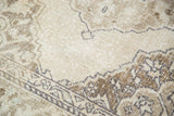 Distressed vintage Sparta runner detail, softened lattice pattern, ivory and beige.