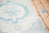 Hand-knotted vintage Oushak runner with octagonal medallion and mallard green, ivory abrashes.