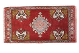 Vintage Oushak rug with cherry red field, grey blush medallion and germinating tree design.