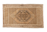 Vintage Oushak rug, elongated hexagonal medallion in celadon and charcoal on golden peach.