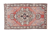 Vintage Oushak rug with cinnabar red field, ornate charcoal and beige medallion, 1'9