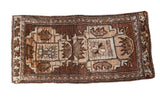 Vintage Oushak rug mat with expressive double medallion, brown and beige wooded tones.