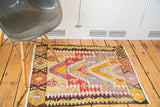 Vintage Kilim rug corner with colorful crab style and geometric stepped patterns.