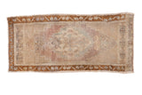 Distressed hand-knotted Oushak rug mat, large mauve medallion, celadon, bronze accents. 1'8