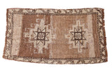 Hand-knotted vintage Oushak rug mat, tribal double star medallions, neutral brown and silver abrashes.