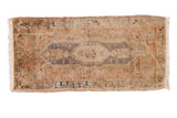 Vintage Oushak rug with lozenge medallion, neutral palette, plush silk-like pile, and abrasions. 1'7