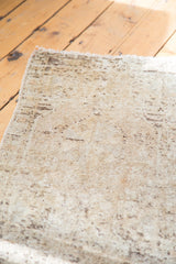 Textural pile of vintage Oushak rug with muted beige and natural brown abrashes.