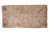 Vintage Oushak rug mat with muted cantaloupe, beige, charcoal, and textural abrashes, 1'8