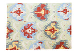 New Ikat-inspired Indian Chainstitch rug, green, blue, red, and saffron palette.
