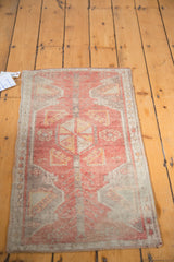 Hand-knotted vintage Turkish Oushak rug with pinwheel medallion, tree design, and faded terra cotta.