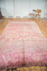 Plush overdyed cranberry mauve and violet pile with tattered end detail.