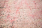 Overdyed character of plush Moroccan carpet pile with cranberry mauve and beige.