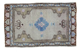Vintage Oushak rug, pale teal floral medallion on beige-grey field with geometric brown and blue patterns, 1'8