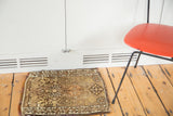 Vintage Oushak square mat with earth tones and tribal curvilinear medallion.