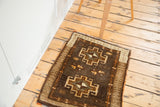 Vintage Oushak rug featuring geometric medallions and nuanced foliage border design.