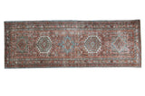 Distressed vintage Karaja runner rug, brick red field, geometric blue-green medallions, 2'10