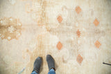 Minimalist vintage Oushak runner with soft bronze, sand, and terra cotta abrashes.