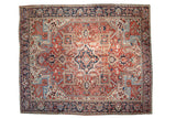 Vintage Heriz carpet, ornate geometric medallion, unusual Herati border, vibrant red, blue, ivory.