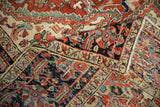 Detailed hand knotted pile and tightly woven foundation on this geometric vintage Heriz carpet.