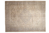Hand-knotted distressed Oushak rug, antique ivory field with silver-grey central medallion.