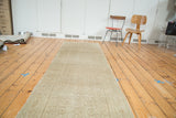 Distressed hand-knotted Malayer runner in sand beige with subtle floral and diamond motifs.