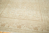 Distressed Malayer runner featuring sand and beige diamond and floral patterns.