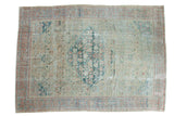 Distressed Antique Sultanabad carpet, oblong medallion, allover Herati, green, terra cotta, blue.