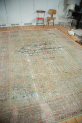 Luminous, distressed antique Sultanabad rug pile with faded mallard green and terra cotta Herati motifs.