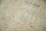 Distressed antique Sultanabad carpet pile showing luminous patina and subtle herati motifs.