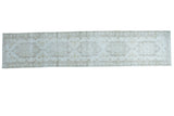 Distressed Oushak runner with five faint ivory and sand medallions, 2'8