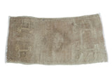 Hand knotted vintage Oushak runner, soft center medallion on sandy beige bronze field.