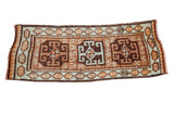 Vintage Oushak rug runner with triple geometric medallions, 'HASAM' text, and brown, tangerine hues.