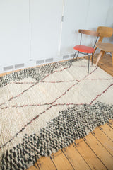 Plush textured vintage Moroccan rug: speckled charcoal, ivory, wine red lines.
