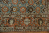 Vintage Veramin carpet's rust main border with bird and floral motifs, blue Mina Khani field.