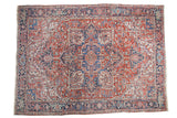 Vintage Heriz carpet, large center medallion, geometric designs in brick red and indigo blue.