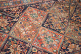 Distressed Afshar rug section with terra cotta, deep blue, and green tribal patterns.