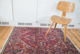 Vintage Northwest Persian rug border with cherry red, navy gerus arabesque pattern.
