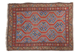 Vintage Northwest Persian rug with geometric madder red field and indigo blue channels, 3'9