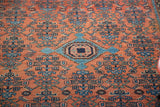 Distressed Malayer rug with brick red field, sky blue Herati and medallion.