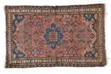 Distressed hand-knotted Malayer rug with dusty rose herati field, checkered blue petal medallion.