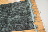 Light blue fringe and acid wash distressed texture on the vintage overdyed runner.