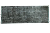 Distressed vintage overdyed gallery runner rug, dark gray mottled pile, light blue fringe, 5x13.3.